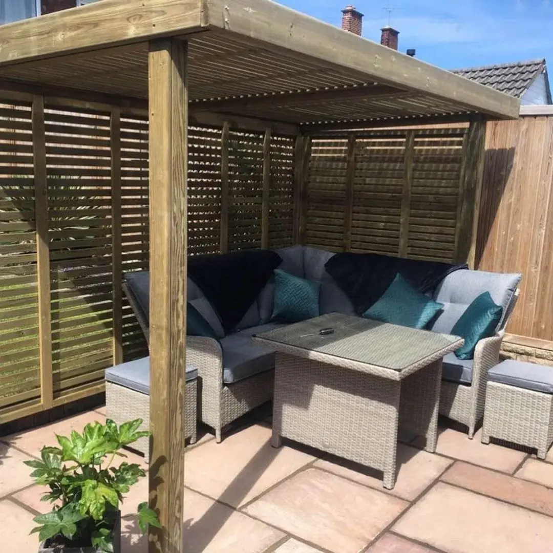 Timber pergola over a patio seating area